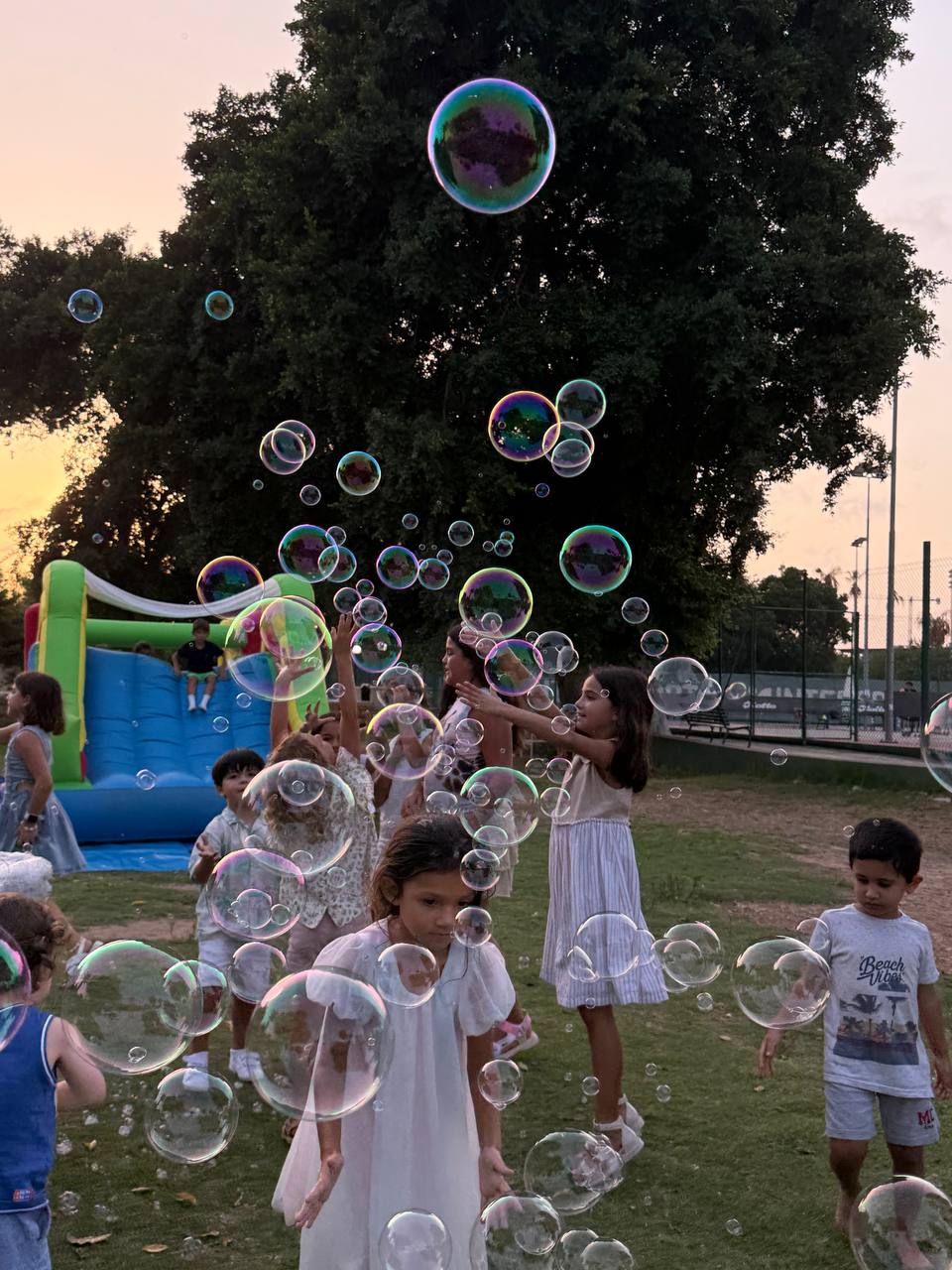 Outdoor bubble show in a school yard
